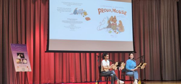 Cara Mentzel and Idina Menzel read from their book, Proud Mouse at an assembly in September. 