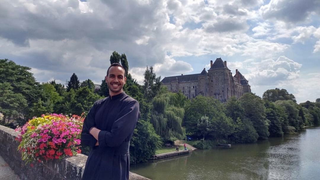 Fr. Rivera poses in Solesmes, France, where he sang at a pilgrimage with St. Josephs Seminary Schola Cantorum from New York.