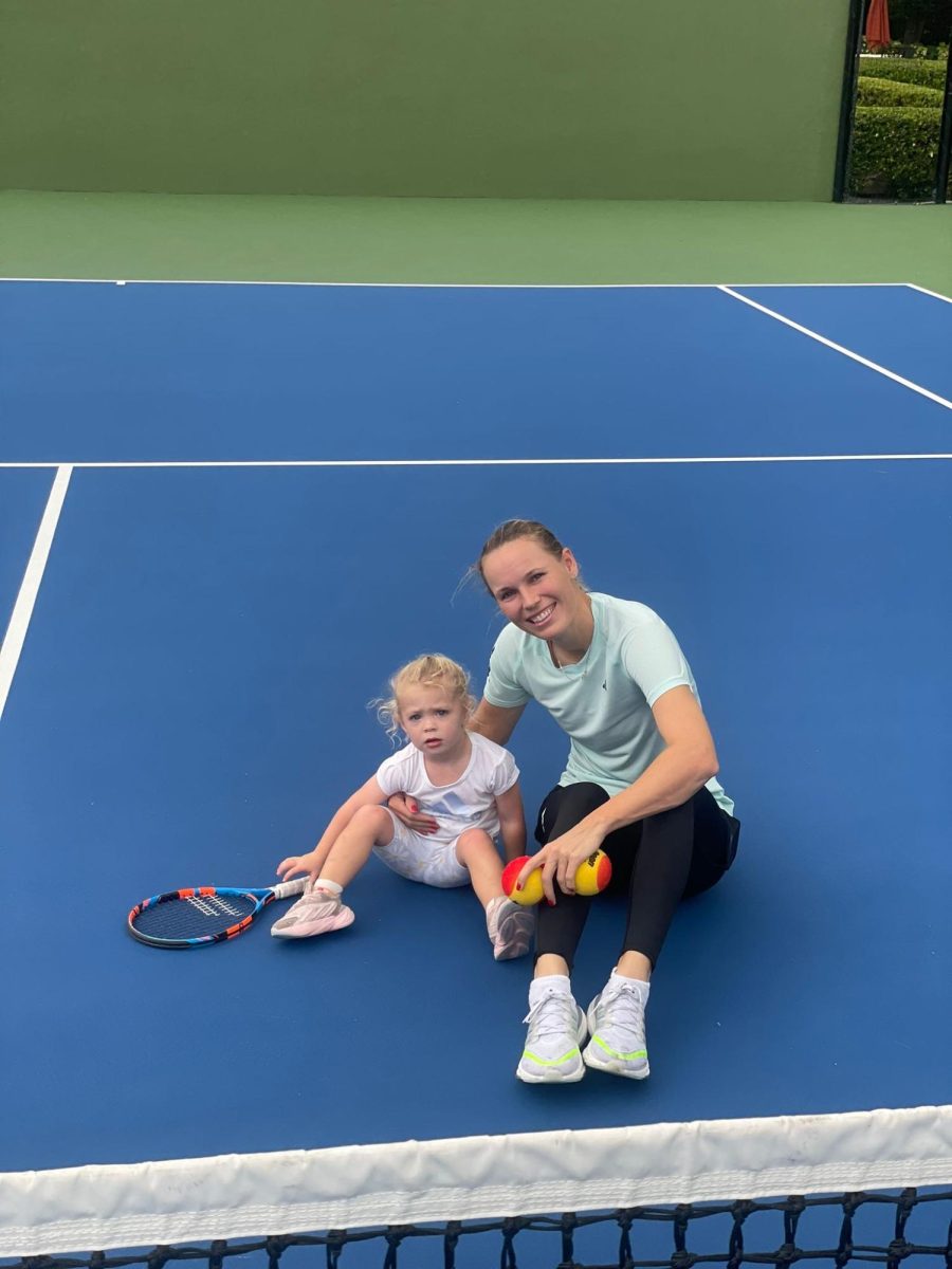 Wozniacki takes a break from tennis with her daughter, Olivia. 