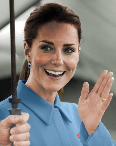 Kate Middleton waves at an event. 