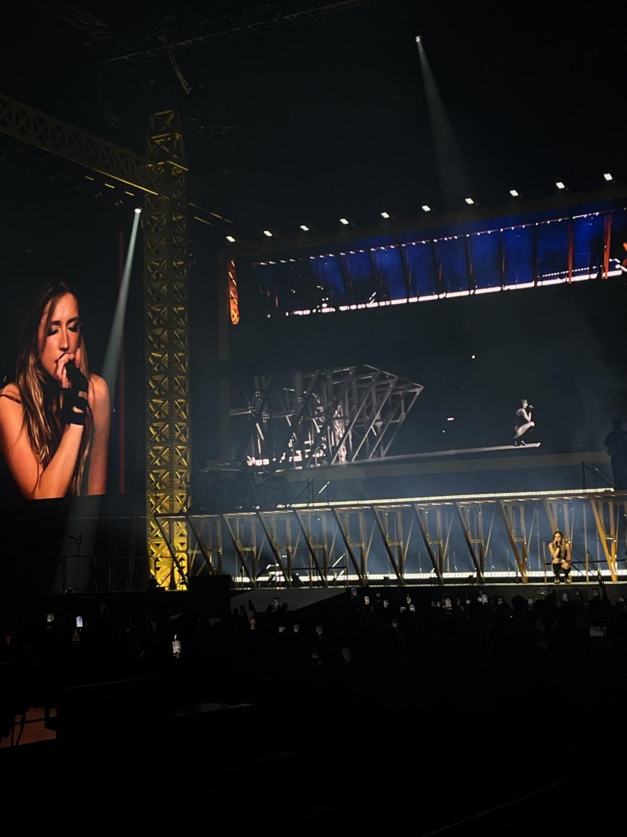 McRae gets close to the crowd as she sings "exes."