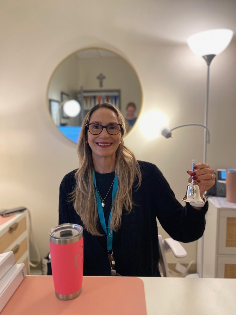 Mrs. Ahlers began the tradition of ringing a bell to commemorate the successful submission of college applications.