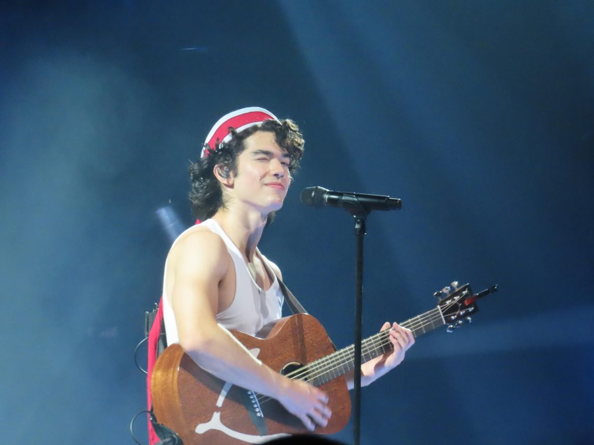 Gray plays his iconic song, "Heather," to fans