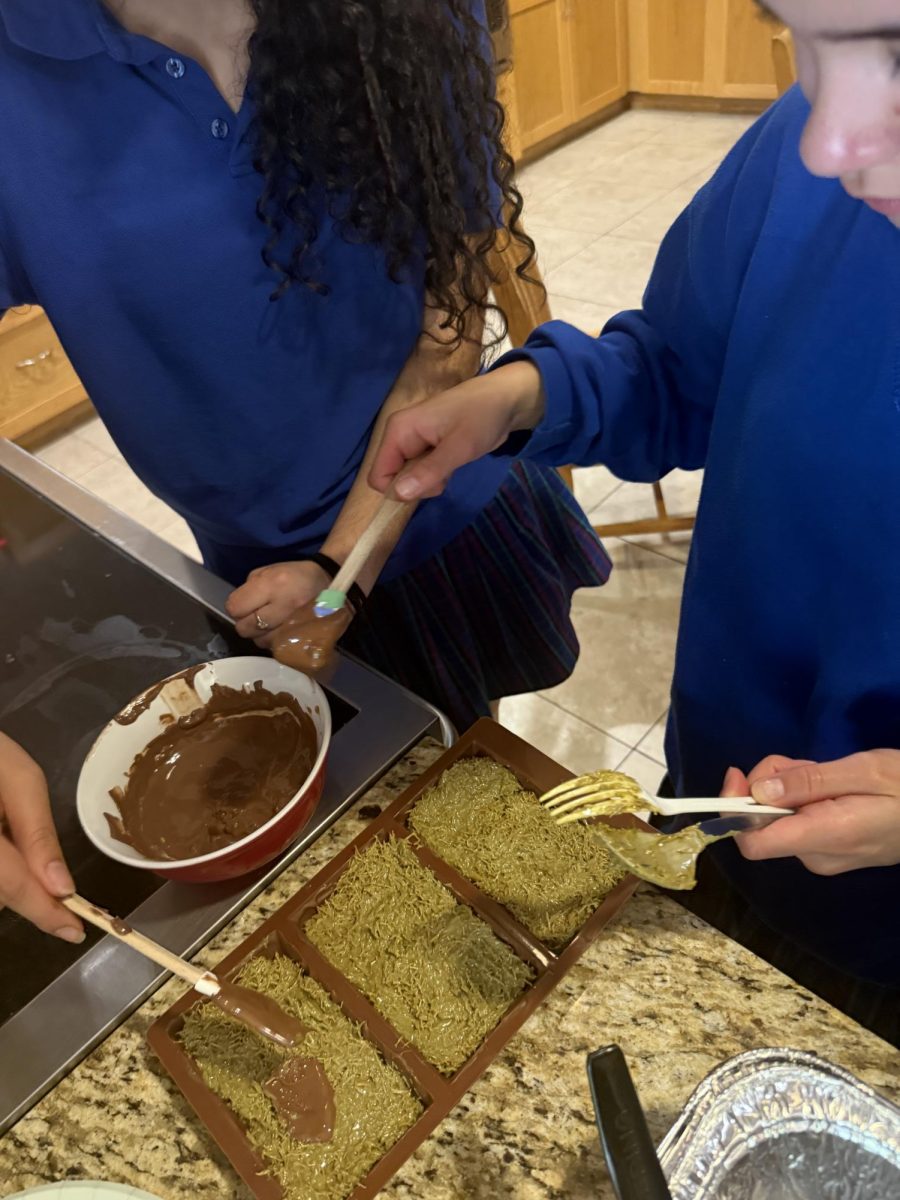 We spread chocolate on top. 