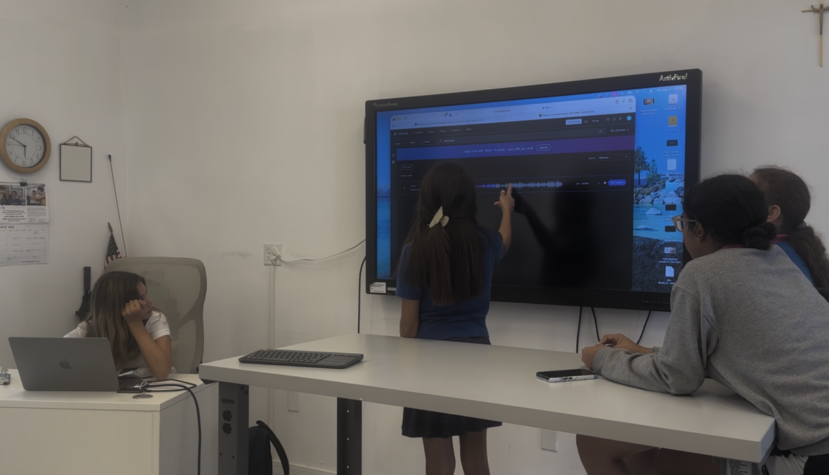 Students work on a video project during Digital Storytelling Studio. 